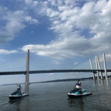 Group of riders on Hudson River jet ski tour under the George Washington Bridge